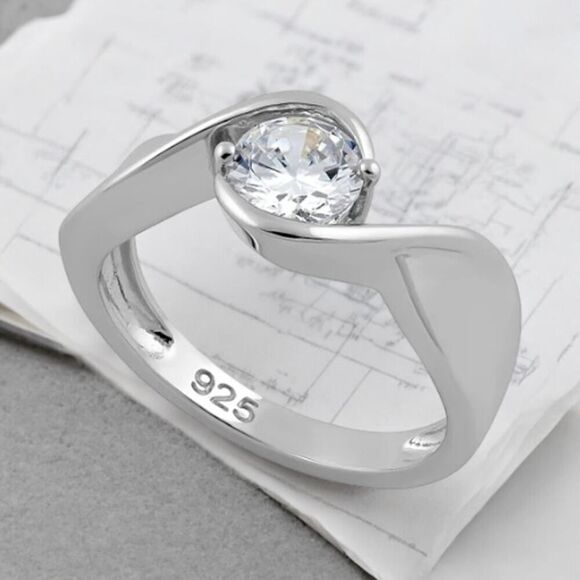 Sterling Silver Twisted Round Clear CZ Ring Sizes 7,8 - Picture 1 of 9